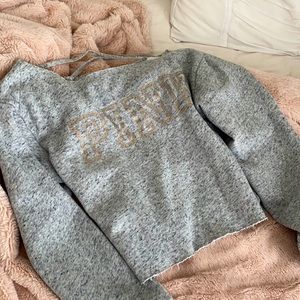 Pink Victoria’s Secret cropped pull over.